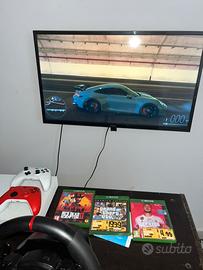 Xbox one con volante e 2 pad originali e giochi