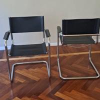 Poltrone in cuoio nero e acciaio