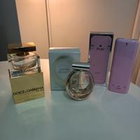 Lotto di tre bottiglie di profumo 