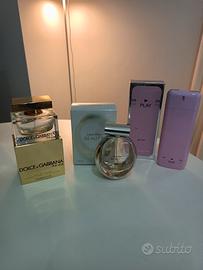 Lotto di tre bottiglie di profumo 