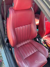 Sedili in pelle rossa alfa romeo 147