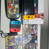 nintendo switch completa+5 giochi+4 joicon+custodi