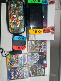 nintendo switch completa+5 giochi+4 joicon+custodi
