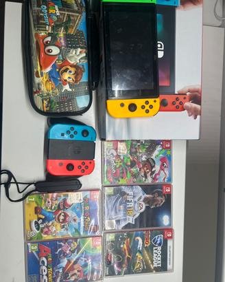 nintendo switch completa+5 giochi+4 joicon+custodi