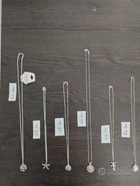 Collane in acciaio con ciondoli