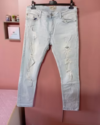 jeans uomo strappati 