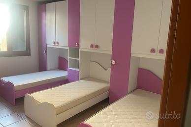 camera da letto con tre ponti