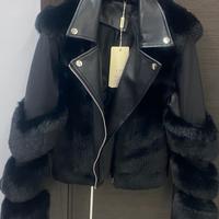 Giacca da donna corta ecopelle con pelliccetta.