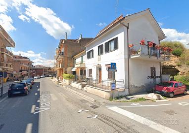 Riano trilocale con balcone e doppi servizi