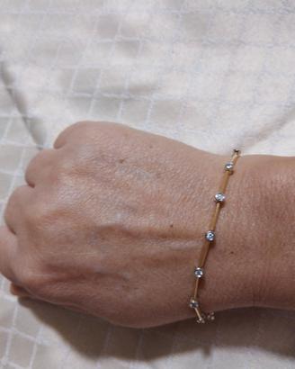 bracciale in oro giallo 18 carati con 14 brillanti
