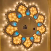 Rosone salentino con specchio e luninarie.