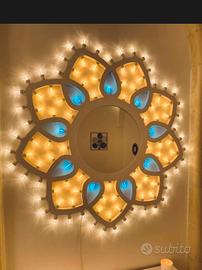 Rosone salentino con specchio e luninarie.