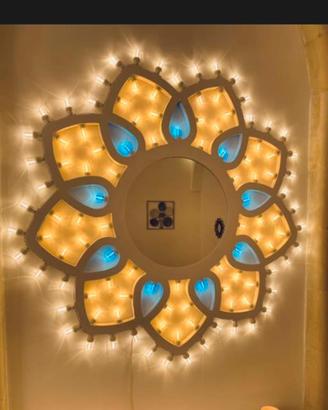 Rosone Made in Salento, con specchio e luminarie.