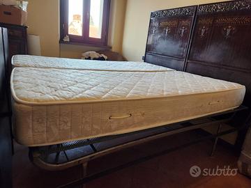 Due materassi singoli + due reti metalliche