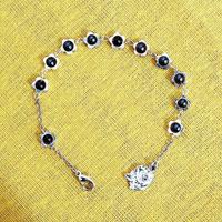Bracciale di Lourdes IN METALLO, PERLE E FIORI