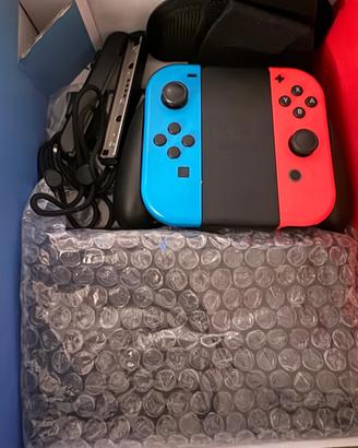 Nintendo Switch completa  + gioco super Mario