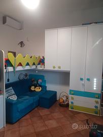 Cameretta con letto a soppalco