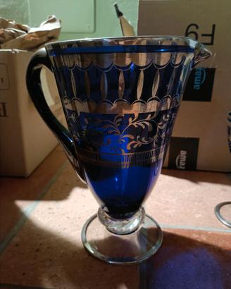 Caraffa e sei coppe in vetro e argento
