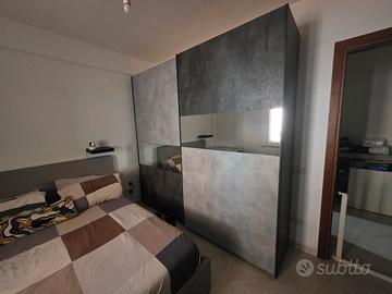 armadio ante scorrevoli con specchio 