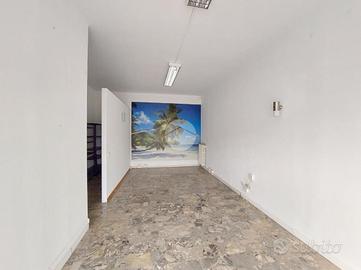 NEGOZIO A TRAVAGLIATO