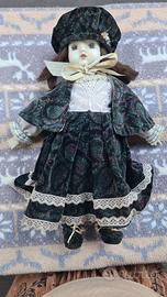 bambola in porcellana Biscuit con capelli veri