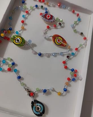 collana lunga conchiglie occhio di bue .