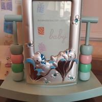 Cornice in argento con carillon per bambino