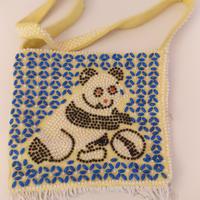 Mini borsa gialla con panda che gioca a palla