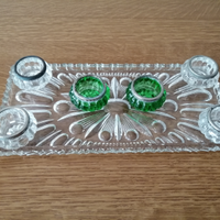 Vassoio in vetro con vasetti