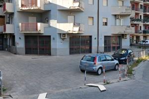 Autorimessa e posti auto all'aperto