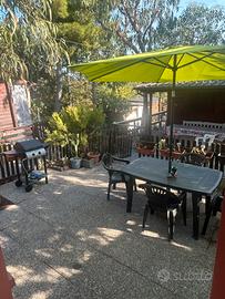 Bungalow e roulotte in camping con piscina