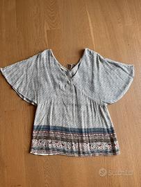Maglia con maniche a pipistrello