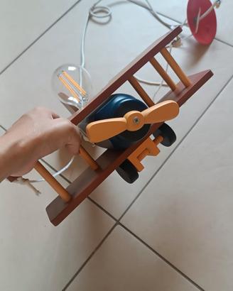 lampadario aeroplano + bastone tenda