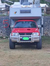 Camper pickup con cellula abitativa