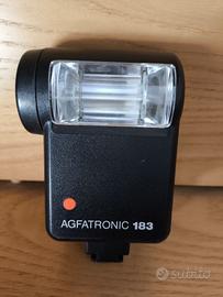 Minolta SRT 100X con obiettivo e flash