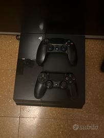PS4 Slim + 7 giochi + 2 controller