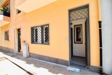 Trilocale ristrutturato con piccolo cortile