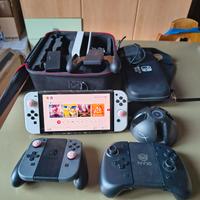 Nintendo Switch OLED + Accessori e Giochi