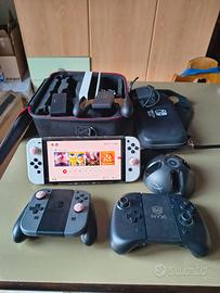 Nintendo Switch OLED + Accessori e Giochi