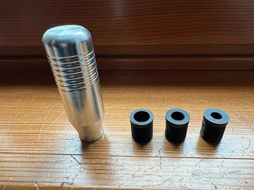 Pomelli cambio e cuffie racing