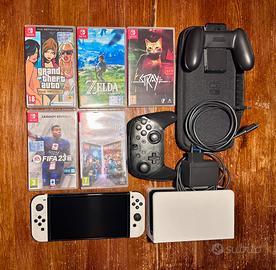 Nintendo Switch Oled , 2 controller, giochi e case