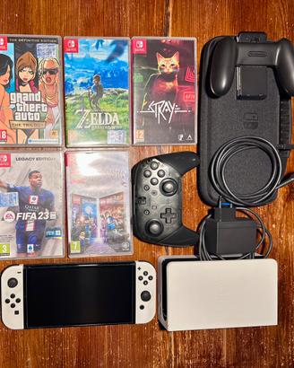 Nintendo Switch Oled , 2 controller, giochi e case