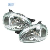 FARI PER OPEL CORSA B 93-00 FONDO CROMATO