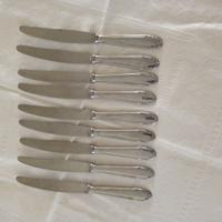 9 coltelli inox 