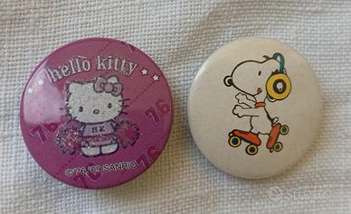 spille vintage Snoopy e Hello Kitty 