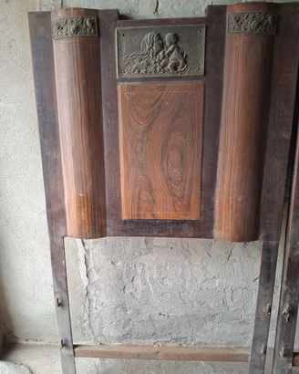 Lettiera in ferro antico