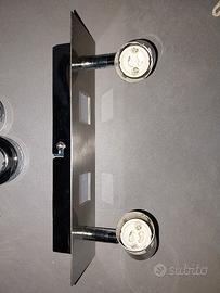 Faretto doppio cromato con 2 + 2 lampadine 