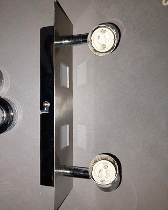 Faretto doppio cromato con 2 + 2 lampadine 