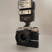 Minolta X‑300 + 28mm f/3.5 + motore + flash