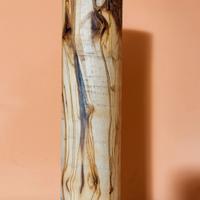 tronco di legno d'ulivo tornito